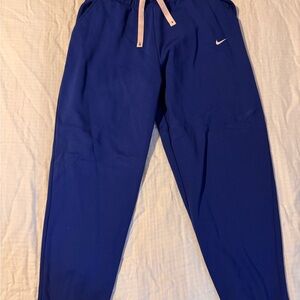 Nike Women's Blue Joggers with Pink Drawstring
